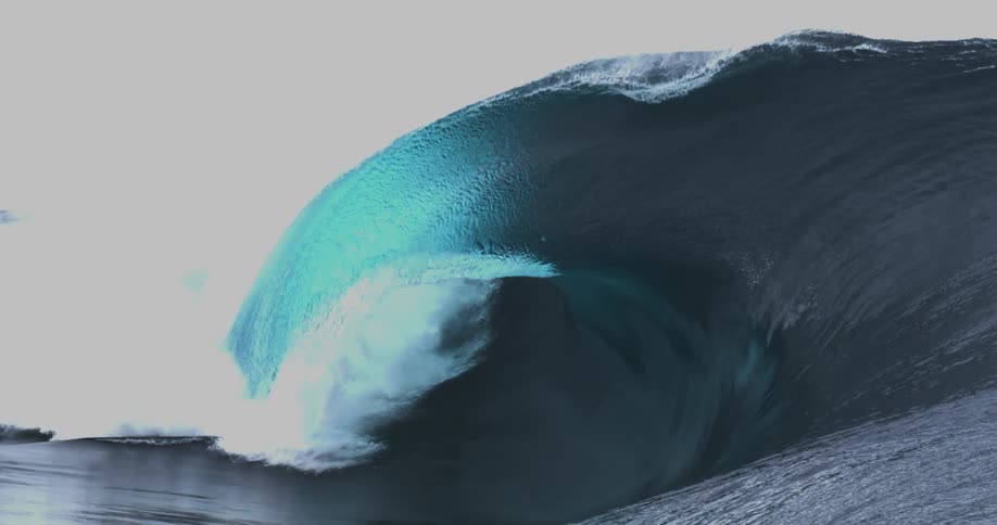 A large ocean wave breaking on the surface of the water