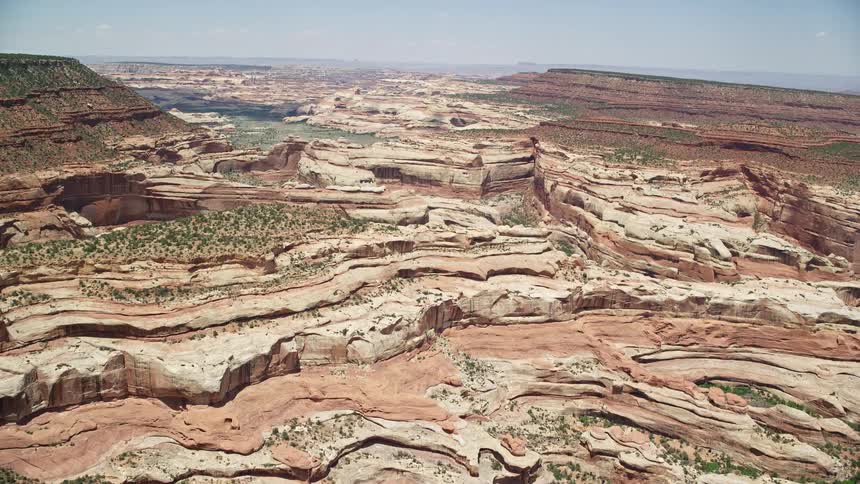  aerial footage of approaching box canyons in Canyonlands National Park Utah with stunning rock formations and cliffs