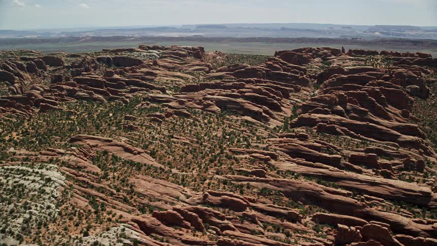 an aerial view of the iconic rock fins at Devil's Garden in Arches National Park Utah showcasing the stunning desert landscape in Southwest United States during a sunny summer day