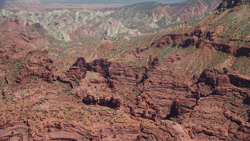  aerial footage of desert rock formations at Fisher Towers Utah showcasing the scenic beauty of the Southwest United States during summer