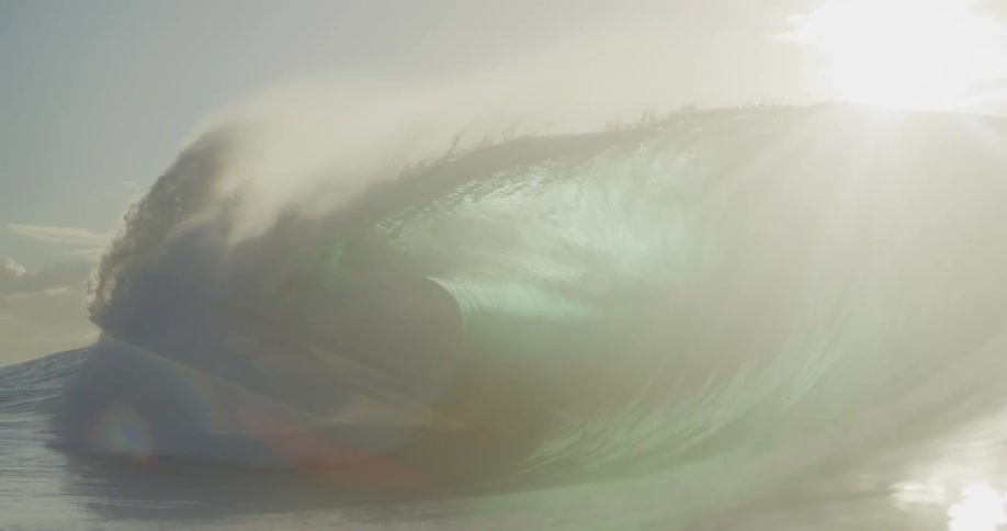 Ocean wave moves across the surface of water