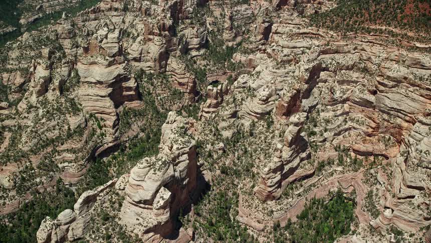 A stunning aerial view of a canyon in the Manti-La Sal National Forest Utah showcasing its unique rock formations and natural beauty