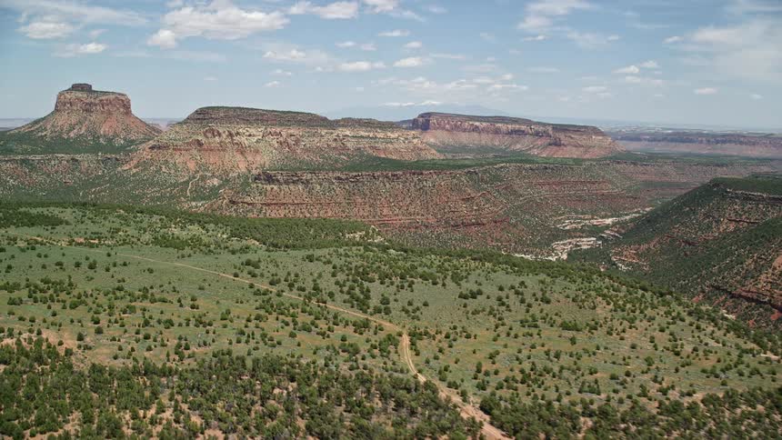 Approaching Cathedral Butte and mesas in Manti-La Sal National Forest Utah showcasing the stunning desert landscape and table mountains