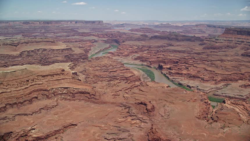  aerial footage showcasing an view of buttes the Colorado River and Meander Canyon in Canyonlands National Park Utah