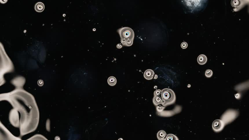 Computergenerated animation of small dots on a black background
