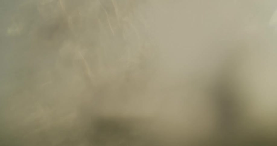 Point of view of a person diving and passing over an ocean wave
