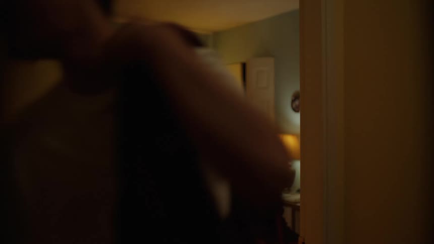 Teenager opens the door and exits the bedroom