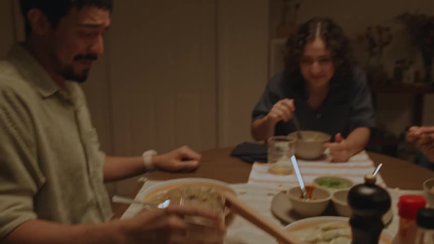 Group of friends have fun talking and laughing at dinner