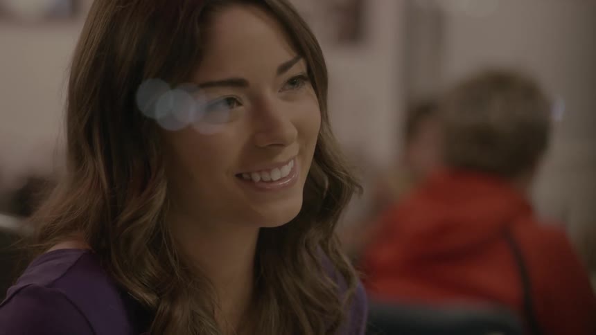 Woman smiles and nods her head