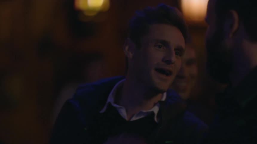 People are in a club talking together