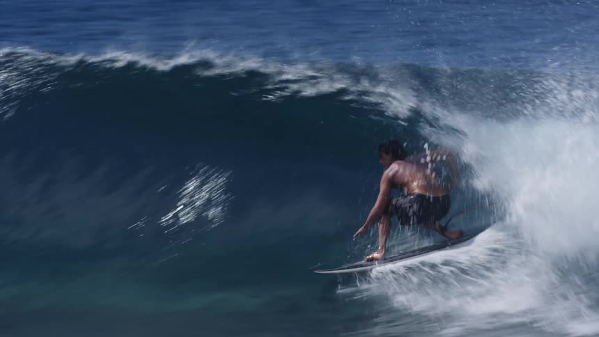 Man holding a small wave from the inside