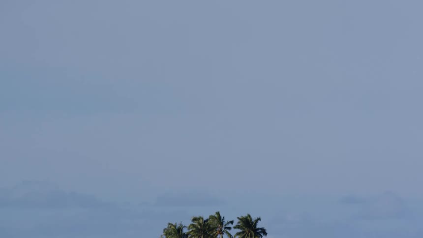 An islet under a clear sky