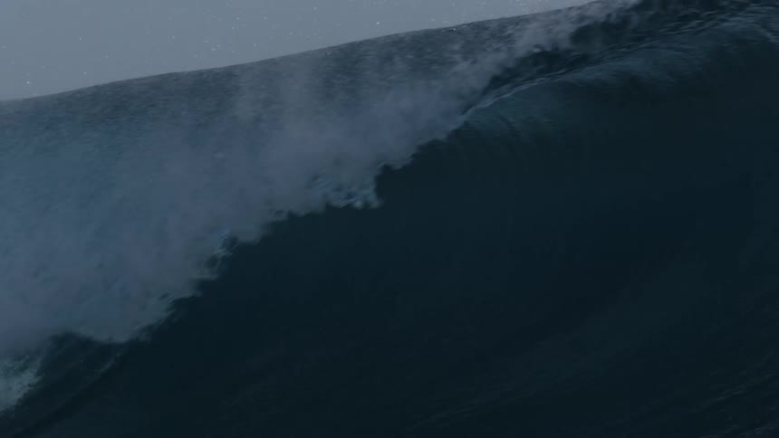 A large ocean wave breaks