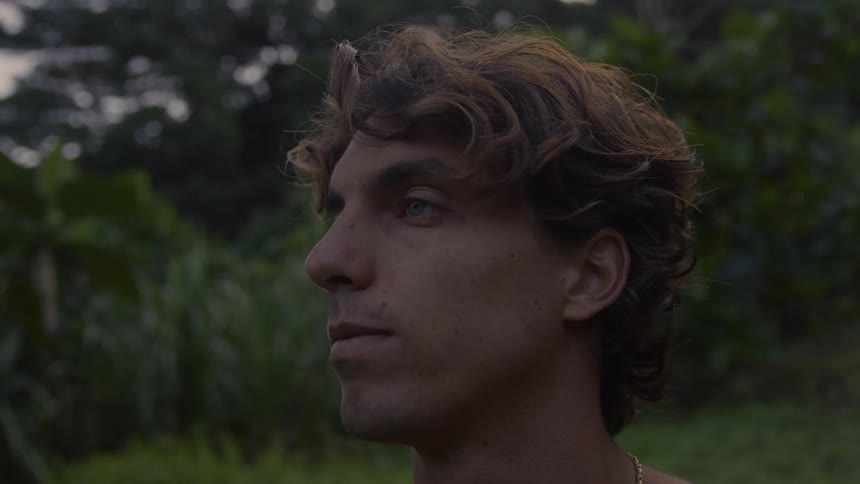 Portrait of a young man in the midst of nature