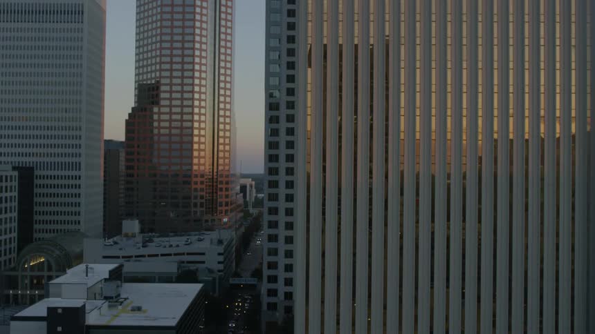 The sunset is reflected on skyscraper windows