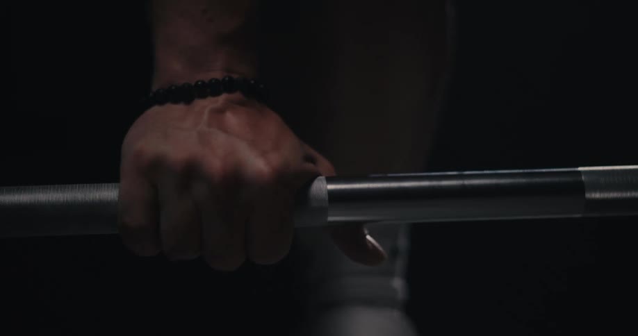 A man is lifting weights