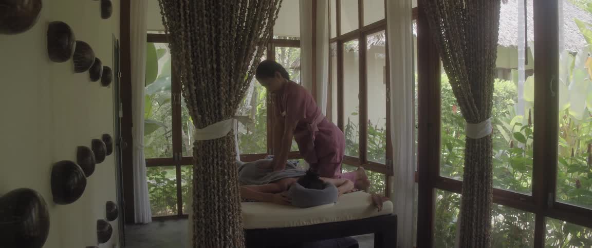 A woman is receiving a massage