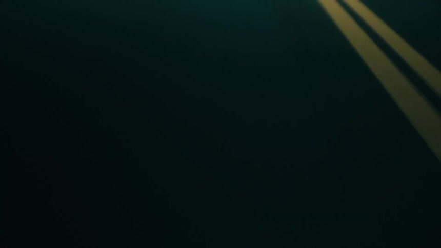 View of the road from a moving highway