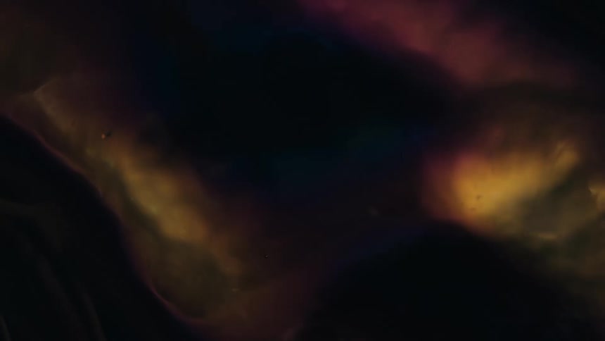 A dark cloud over colorful abstract waves with shadows over it