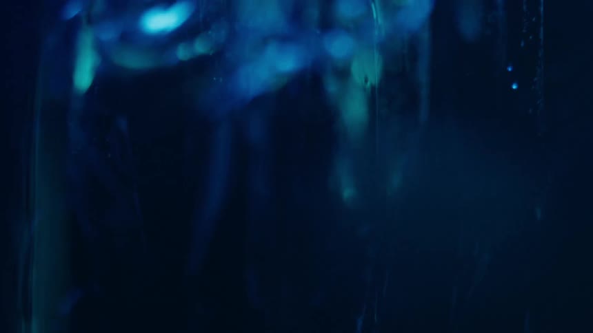 Abstract object with shading and blue coloring featuring liquids