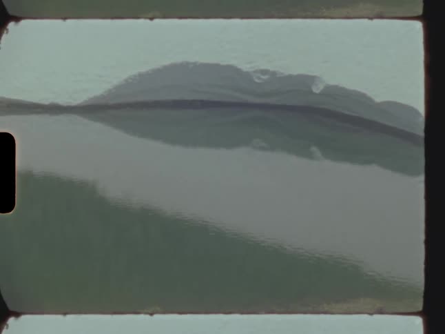 Landscape of body of water and distant mountains