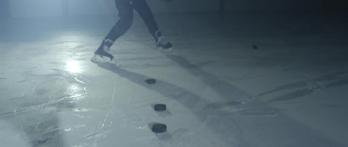 Person training on a hockey rink