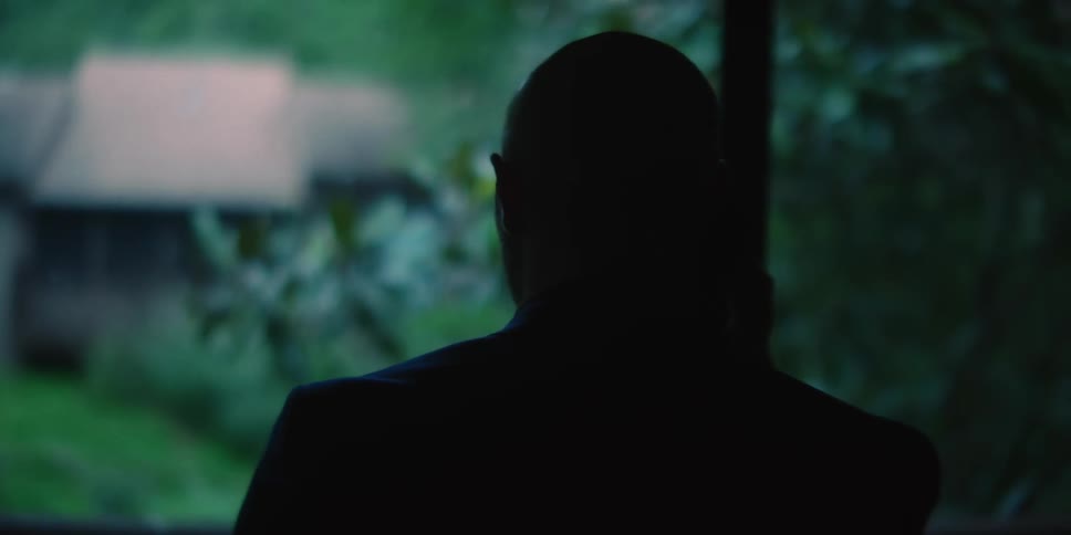 Person in silhouette talks on cell phone