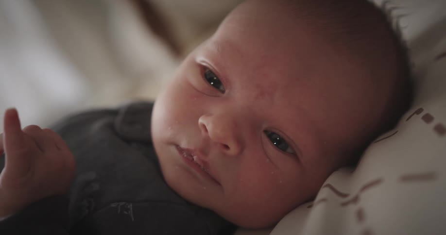 Portrait of a lying baby