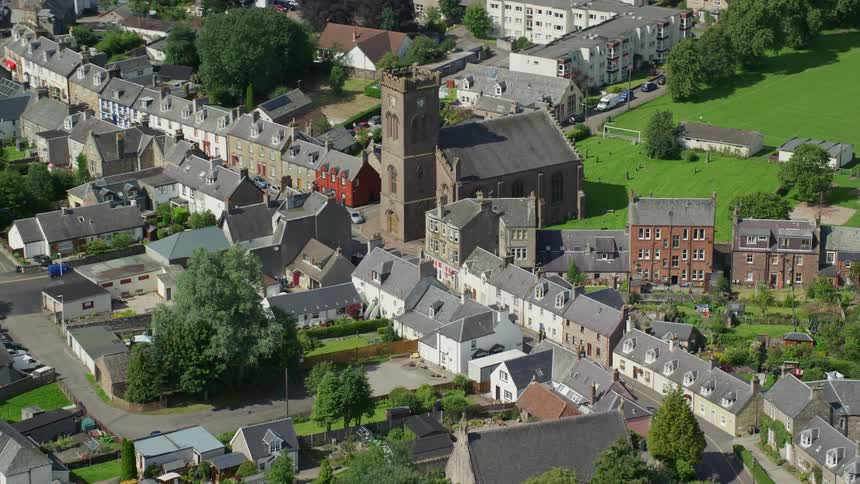 Aerial of a suburban neighborhood during a sunny day