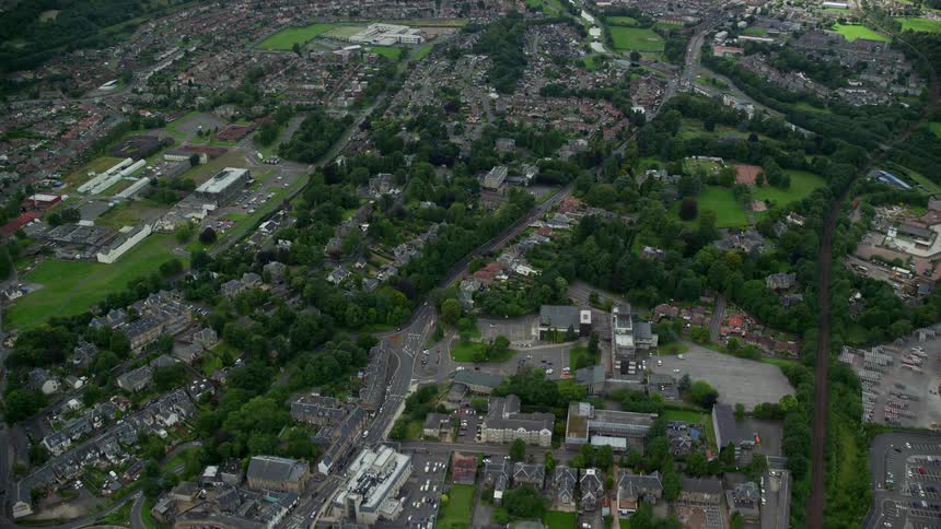 Aerial of a residential district with greenery on the outskirts of the city