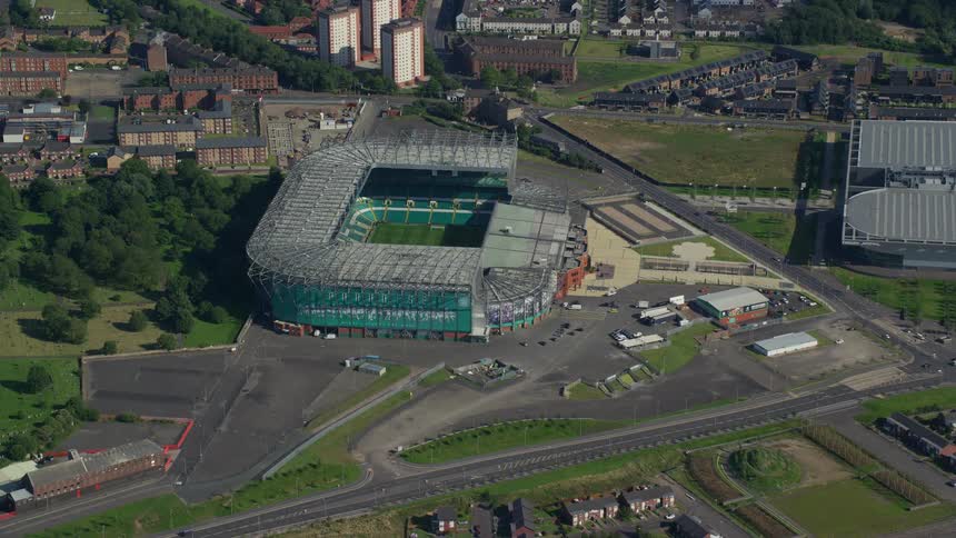 Aerial view of a stadium in the midst of an urban city