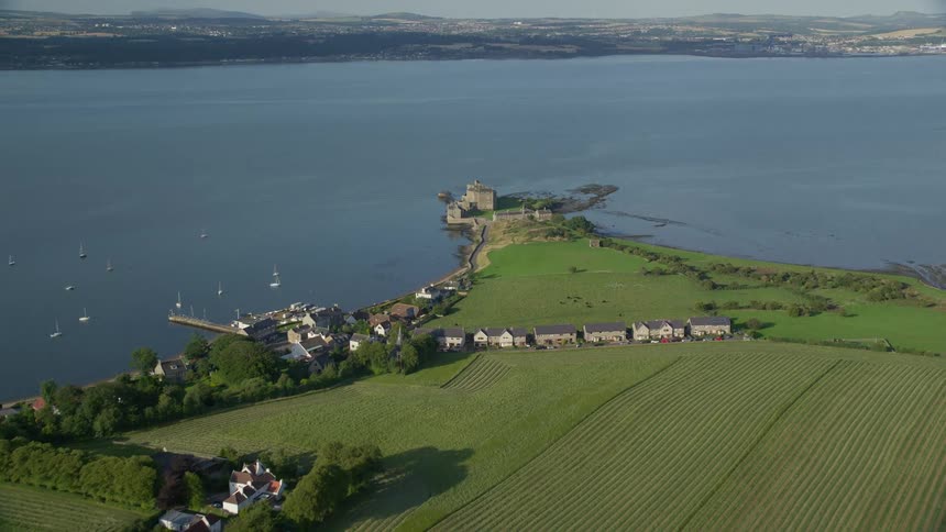 Homes are around the farm land