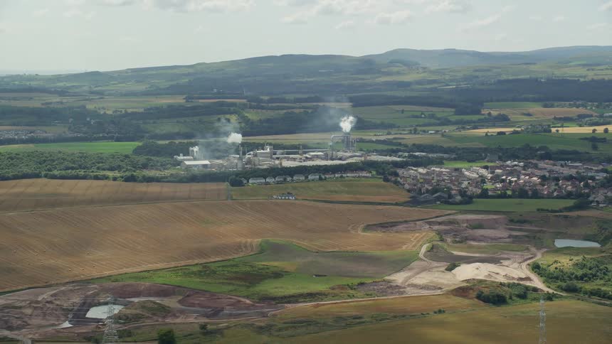 Aerial view of a power plant or factory in the countryside