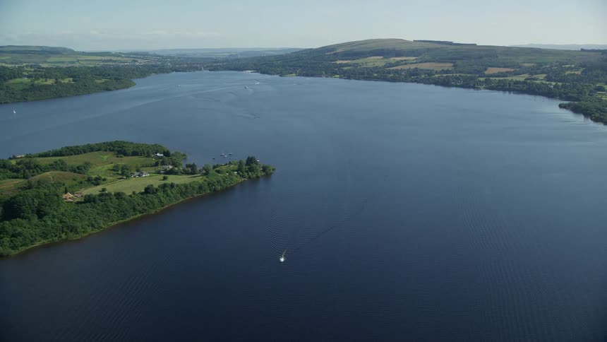 A huge lake with an islands and shore full of vegetation
