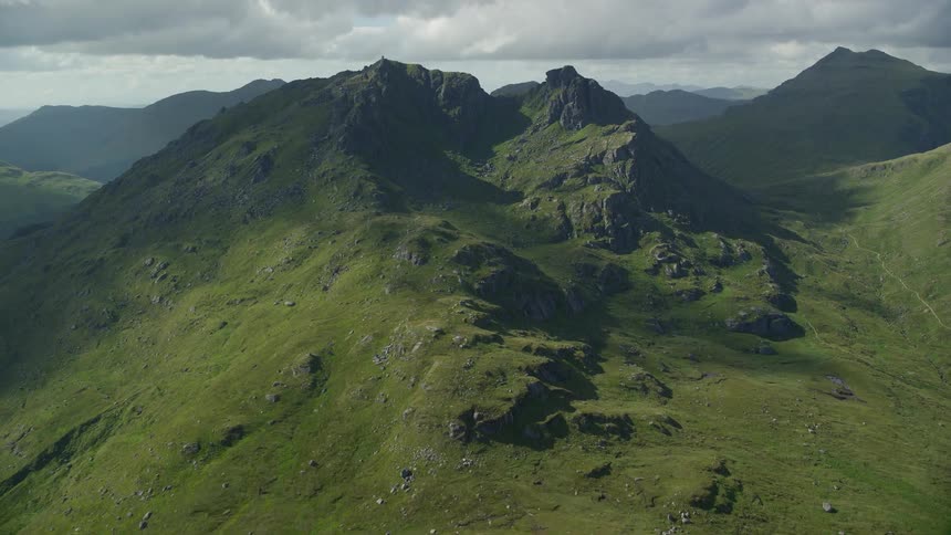Aerial view of a mountain range and cliffs