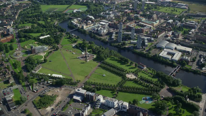 Aerial view of a river twisting through a city