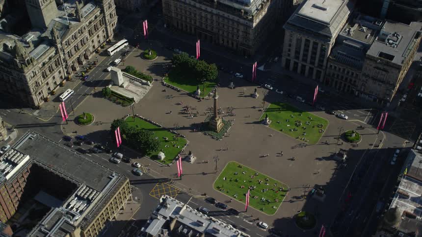 Aerial view of a public square surrounded by a city