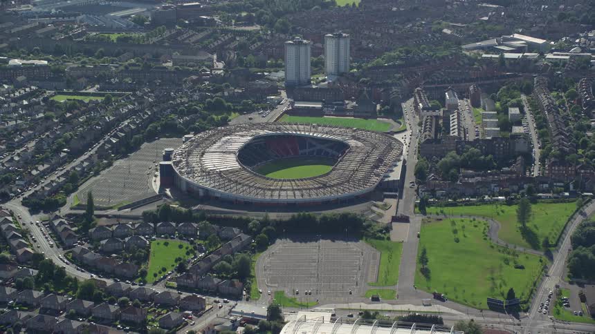 Aerial view of a stadium in the middle of a city