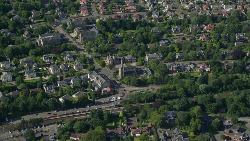 Aerial of a church in the middle of an european suburb