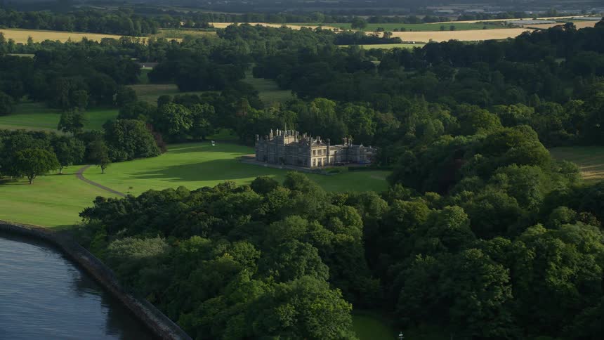 Aerial view of a stately manor in the countryside