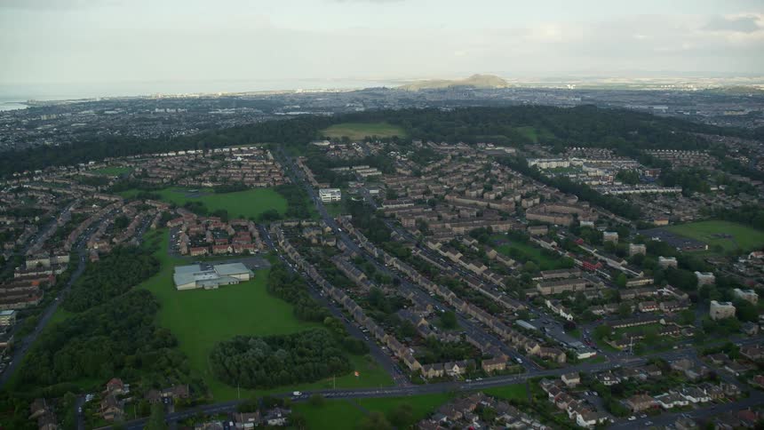 Aerial of a rural neighborhood with small houses and quiet streets