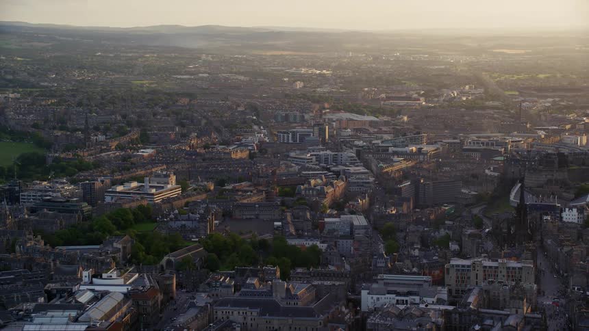 Urban city aerial with classic architecture buildings during sunset