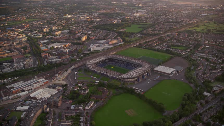 Aerial of a soccer field in an urban city
