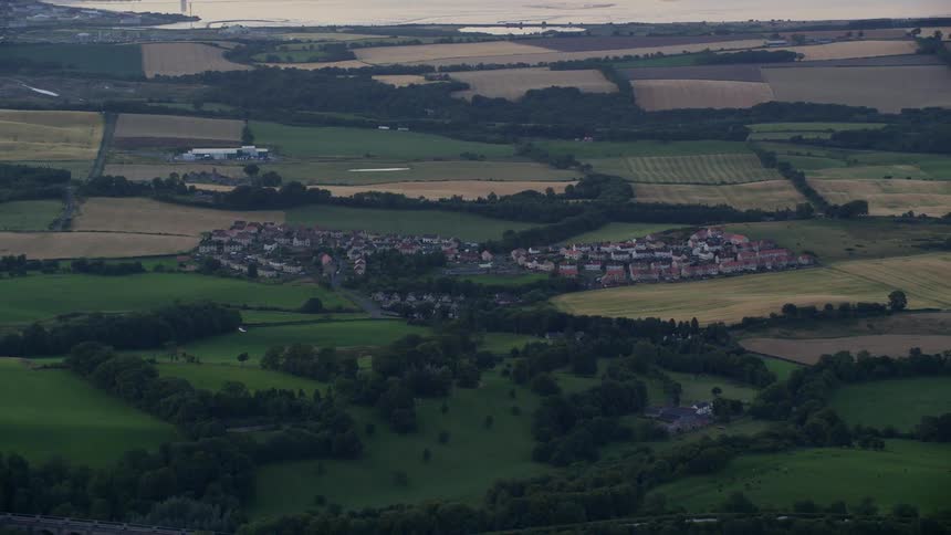 Aerial view of a rural area with some residences