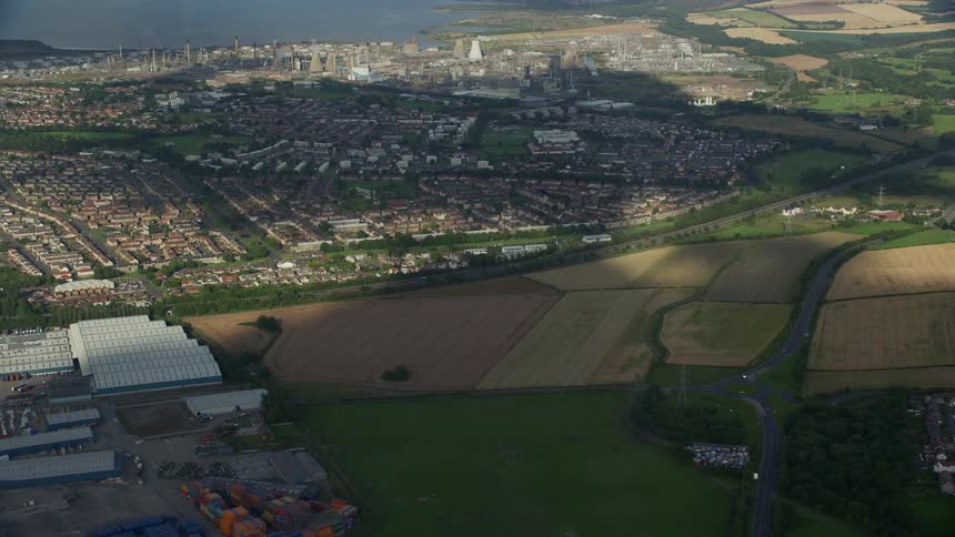 Aerial view of a small town next to a river at daytime