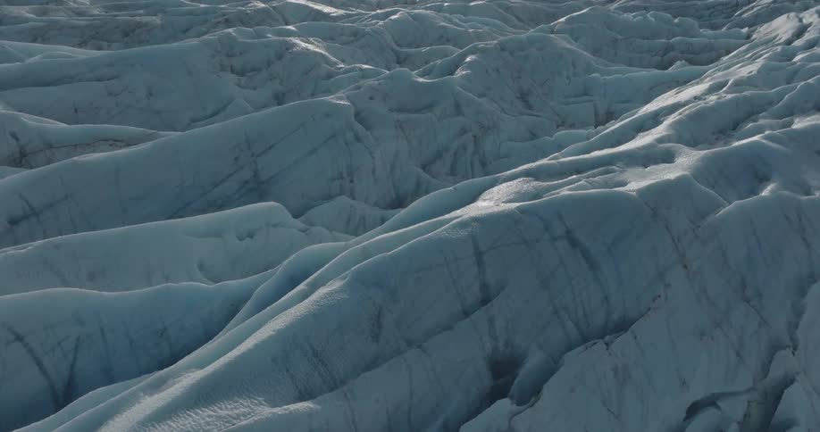 Aerial view of ice sheets on a glacier at daytime