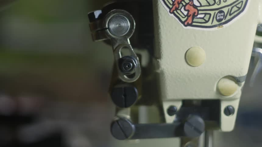 Closeup of a sewing machine in action