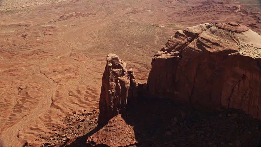 Aerial of mesa in a desert area at midday