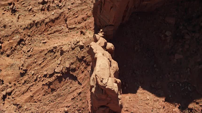 Aerial view of desert plateau with hills and a rocky terrain
