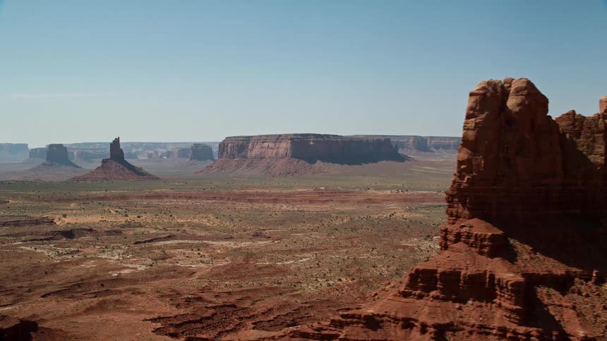 Aerial of a wild landscape with red mountains at daytime
